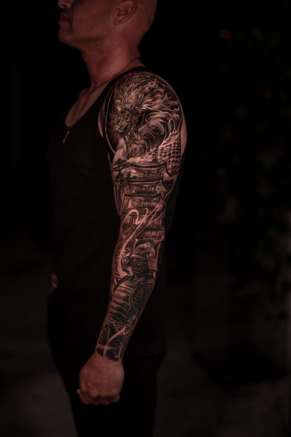 Black and grey Japanese dragon and samurai full sleeve tattoo